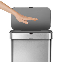 58L rectangular sensor bin with voice and motion control - brushed finish - lifestyle hand over sensor image